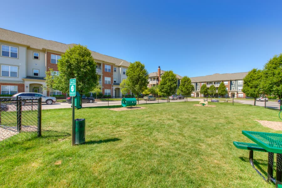 Fenced dog park with waste station at apartment complex